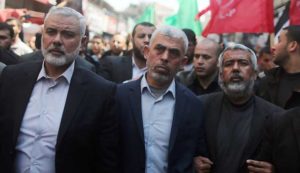 Hamas Gaza Chief Yehya Al-Sinwar and Hamas leader Ismail Haniyeh take part in the funeral of senior militant Mazen Fuqaha in Gaza City
