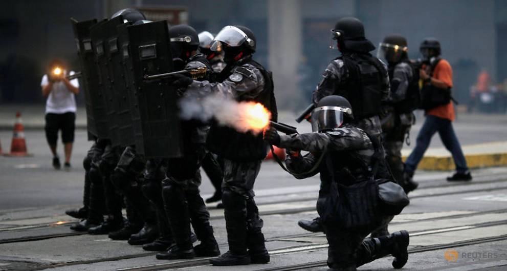 Protesters, Police Clash in Brazil’s 1st General Strike in Decades