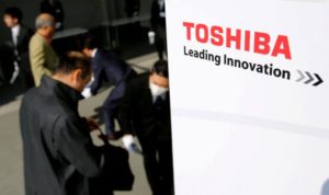 The logo of Toshiba is seen as shareholders arrive at Toshiba's extraordinary shareholders meeting in Chiba
