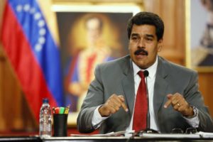 Maduro speaks during a news conference at Miraflores palace in Caracas