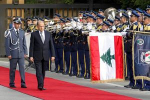 Aoun reviews the honour guards upon arrival to the presidential palace in Baabda