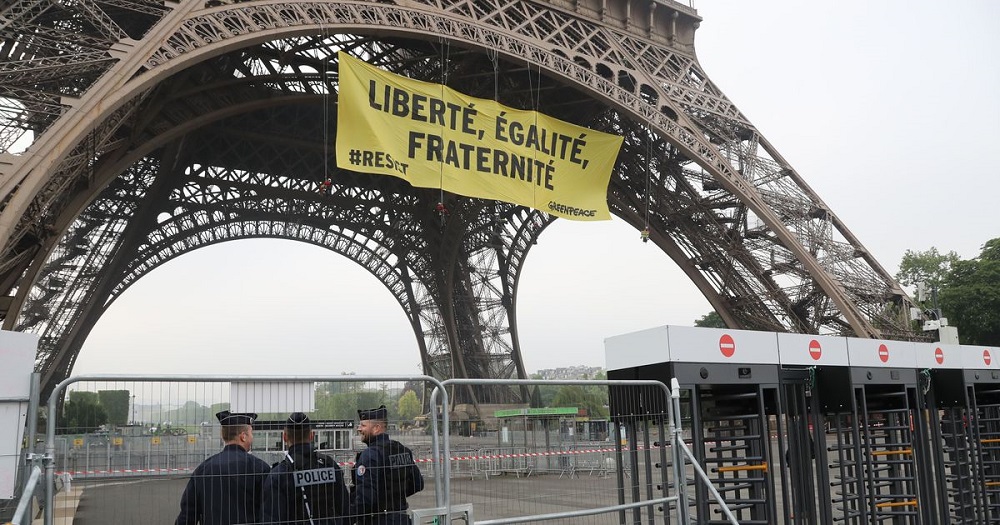 Security Concerns Raised after Greenpeace Unfurls Political Banner on Eiffel Tower