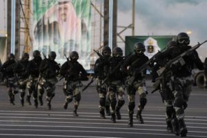 Members of the Saudi security forces take part in a military parade in Mecca
