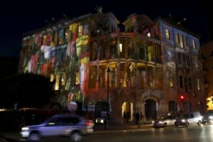 The historic Beit Beirut building is seen illuminated during a ceremony marking the end of its restoration in Beirut