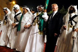 Trump dances with a sword as he arrives to a welcome ceremony by Saudi Arabia's King Salman at Al Murabba Palace in Riyadh
