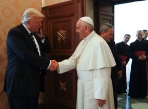 Pope Francis meets US President Donald Trump and his wife Melania during a private audience at the Vatican