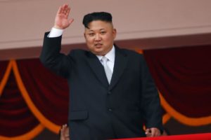 FILE PHOTO: North Korean leader Kim Jong Un waves to people attending a military parade marking the 105th birth anniversary of country's founding father, Kim Il Sung in Pyongyang