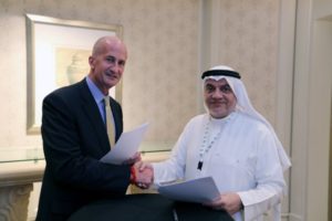 Vice Chairman of General Electric Co. John Rice and Saudi Governor of Small & Medium Enterprises Ghassan Ahmed Al Sulaiman pose for photos after signing their agreements at the Saudi-US CEO Forum 2017 in Riyadh, Saudi Arabia May 20, 2017.