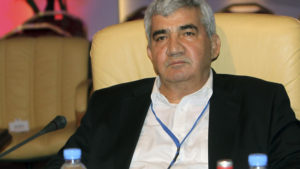 Syrian dissident Riad Seif attends a meeting of the Syrian National Coalition for Opposition and Revolutionary Forces, formed after the Syrian National Council (SNC) agreed to the new group, in Doha, Qatar