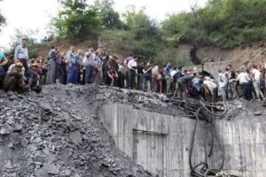 People gather at the site of an explosion in a coal mine in Golestan Province, in northern Iran.