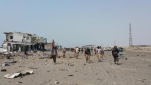 Southern Resistance fighters gather in the al-Alam entrance of Yemen's southern port city of Aden, after taking control from Houthi fighters