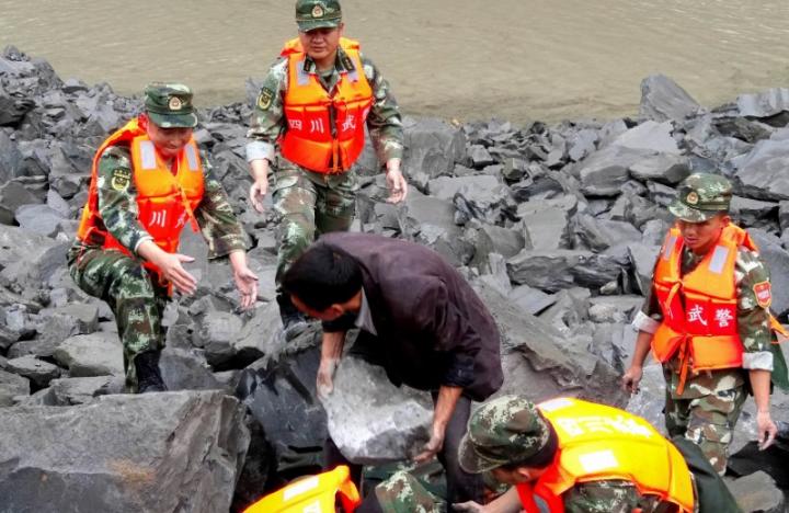 Over 140 People Feared Buried in China Landslide