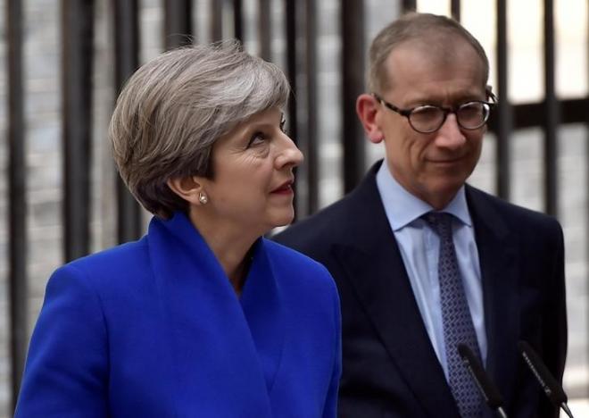 May Scrambles to Form New Govt. after Elections Defeat