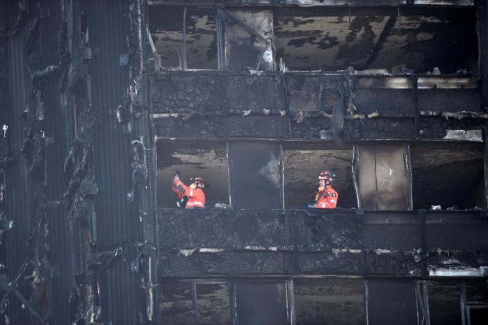 Over 50 Possibly Killed in London Tower Fire, PM May Admits Failings