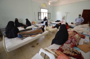 Women sit with relatives infected with cholera at a hospital in the Red Sea port city of Hodeidah, Yemen.