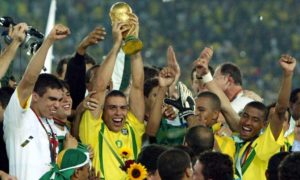Ronaldo lifts the trophy after Brazil win the 2002 World Cup with a 2-0 victory over Germany.