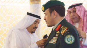 King Salman decorates Mutairi with his new rank. Sunday July 23 SPA
