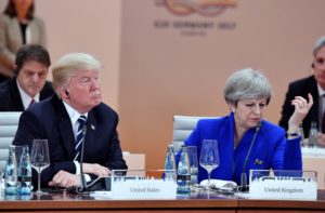 US President Donald Trump and Britain's Prime Minister Theresa May sit at the start of the first working session of the G20 meeting in Hamburg, Germany, July 7, 2017.