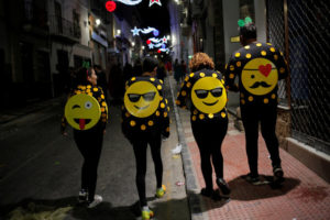 Revellers dressed up as emoticons take part in New Year celebrations in Coin, near Malaga, southern Spain, January 1, 2017.