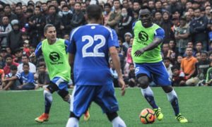 Michael Essien is watched by thousands of fans during practice for Persib Bandung, where he reportedly earns an annual salary of $750,000, around £10,000 a week.