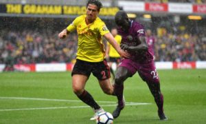 Manchester City’s left-back Benjamin Mendy bursts past Daryl Janmaat of Watford during the visitors 6-0 win at Vicarage Road.
