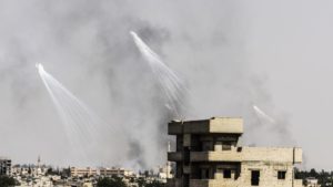 Smoke is seen following an airstrike on the western frontline of Raqqa on July 17, during an offensive by the US-backed Syrian Democratic Forces, a majority Kurdish and Arab alliance, to retake the city from ISIS fighters.