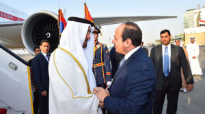 Egyptian President Abdel Fattah el-Sisi (R) shakes hands with Abu Dhabi Crown Prince Sheikh Mohammed bin Zayed Al Nahyan