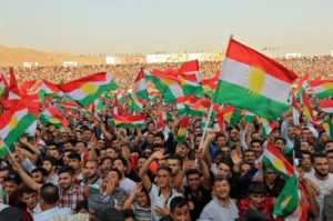 Kurdish people attend a rally to show their support for the upcoming September 25th independence referendum in Duhuk