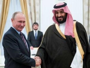 Russian President Putin shakes hands with Saudi Deputy Crown Prince and Defence Minister bin Salman during a meeting at the Kremlin in Moscow